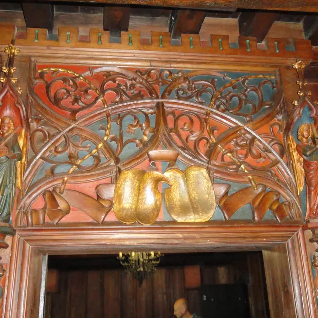 A carved and painted doorway inside the Kaiser’s hall at Haut-Kœnigsbourg
